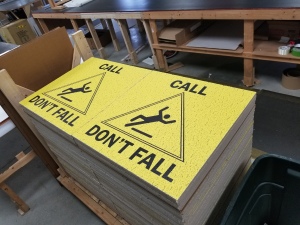 ceiling tiles with call don't fall message