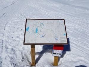 sign showing hiking trail maps